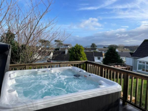Family holiday home in Benllech with hot tub